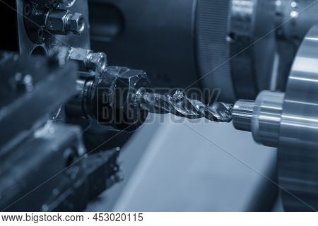 The  Cnc Lathe Machine Bore Cutting The Brass Pipe Connector Parts. The Hi-technology Metal Working 