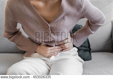 Flatulence Young Asian Woman, Girl Hand In Stomach Ache, Suffer From Food Poisoning, Abdominal Pain 