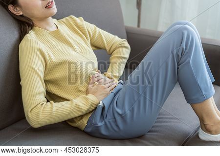 Flatulence Young Asian Woman, Girl Hand In Stomach Ache, Suffer From Food Poisoning, Abdominal Pain 