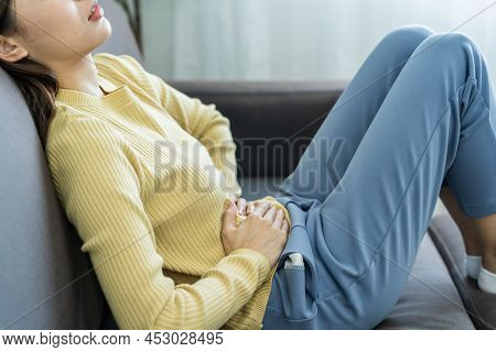 Flatulence Young Asian Woman, Girl Hand In Stomach Ache, Suffer From Food Poisoning, Abdominal Pain 