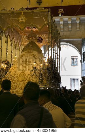 Elche, Spain- April 13, 2022: Virgin Mary On Easter Parade With Bearers And Women Wearing Mantilla D