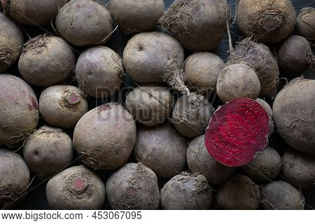 Raw Beetroot Sliced On Leaves. Top View , Copy Space.