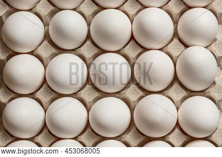 Chicken Eggs White In A Tray. View From Above.