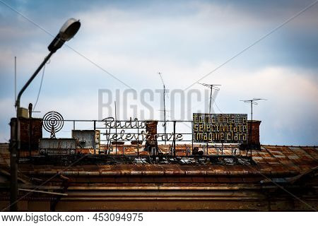 A Scene From The City Of Fagaras (in Brasov County, Romania). These Are Some Old, Abandoned Signs Fr