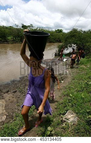 Itaju Do Colonia, Bahia, Brazil - November 29, 2011: Pataxo Ha Ha Hae Ethinian Indian Collecting Wat