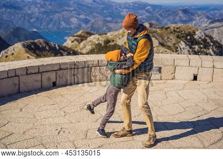 Dad And Son Travellers In Mountain Landscape At National Park Lovcen, Montenegro. Travel To Monteneg