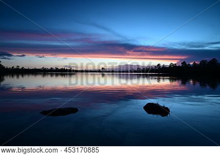 Beautiful Sunset Cloudscape Over Pine Glades Lake In Everglades National Park, Florida Reflected In 