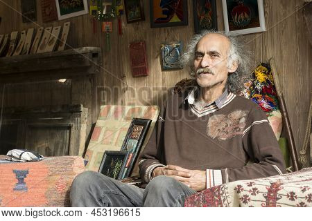 Masuleh, Iran - December 22, 2017 Old Man Portrait At His Shop, Selling Earthenware Artworks.