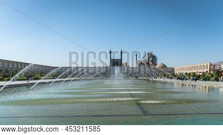Isfahan, Iran - May 2019: Naqsh-e Jahan Square With A Big Pond And Many Fountains