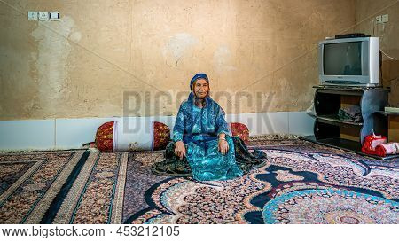Shiraz, Iran - May 2019: Qashqai Turkish Woman Wearing A Traditional Dress In Her House