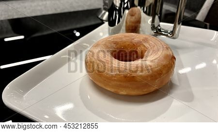 Sweet Bun, Bagel With Sprinkles For Tea. Dessert Served On The Table