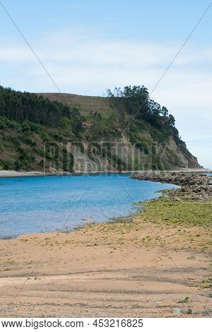 Vertical Shot Of Puntal Beach With No People. Asturias, Spain. Europe