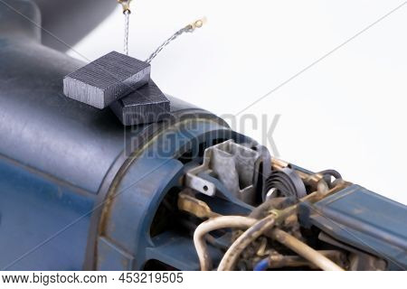 Carbon Brushes Isolated On A White Background. Brushes For Electric Motor.spare Parts For Angle Grin