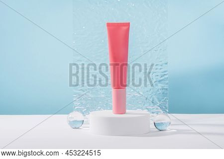 Unbranded Cosmetic Cream Mockup On Pedestal Podium With Stylish Props, Glass Balls And Acrylic Plate