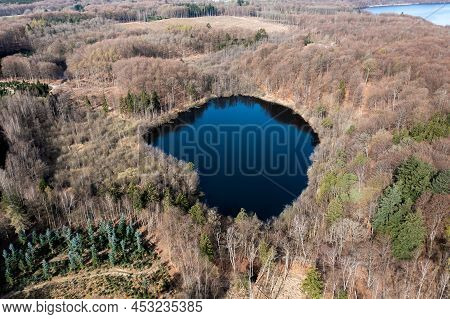 Bagsvaerd, Denmark - April 20, 2022: Aerial Drone View Of Store Hulsoe Lake In Northeastern Zealand.