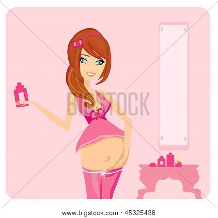 Donna incinta lubrifica lo stomaco rimedio contro le smagliature
