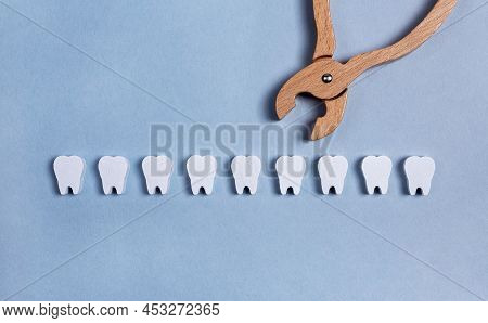 Teeth Row With Forceps. Surgical Tooth Extraction Or Dental Implantation. Removal Operation. Health 