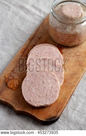 Homemade Jagdwurst On A Rustic Wooden Board, Side View.