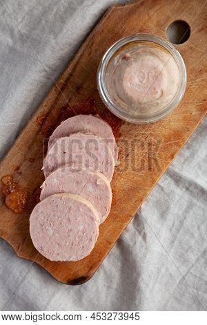 Homemade Jagdwurst On A Rustic Wooden Board, Top View. Flat Lay, Overhead, From Above.