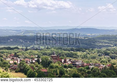 View Of Medieval Red Sandstone Collonges-la-rouge Village And Surrounding Valleys And Hills Covered 