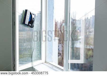 Vacuum Cleaner Robot Cleaning Window In High Building Outdoor