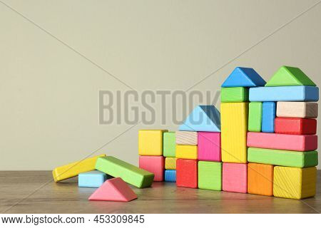 Many Colorful Building Blocks For Aba Therapy On Wooden Table. Space For Text