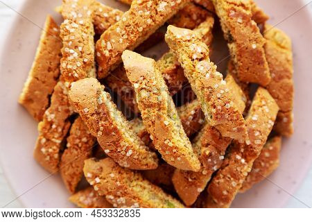 Homemade Italian Cantuccini With Pistachios And Citron On A Plate, Top View. Crispy Pistachio And Ci