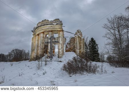The Ruins Of The Ancient Trinity Church On A Gloomy February Day. Village Of The Fifth Mountain. Len