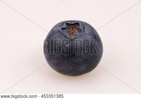 Detailed Closeup On A Single European Blueberry, Vaccinium Myrtillus Against A White Background