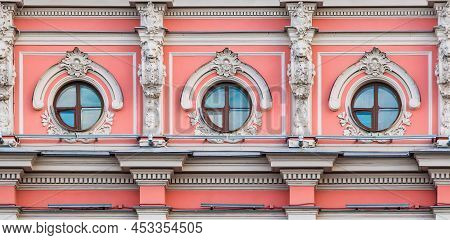 Three Windows In A Row On The Facade Of The Urban Historic Apartment Building Front View, Saint Pete