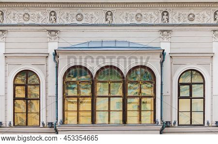 Several Windows In A Row On The Facade Of The Urban Historic Apartment Building Front View, Saint Pe