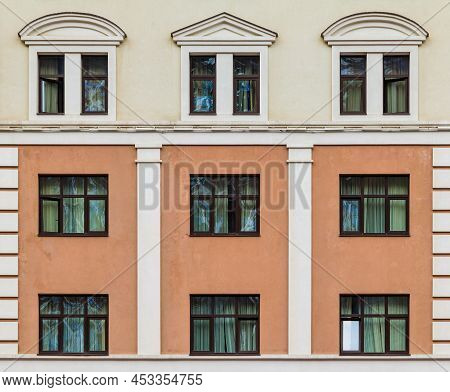 Many Windows In A Row On The Facade Of The Modern Urban Apartment Building Front View, Krasnaya Poly