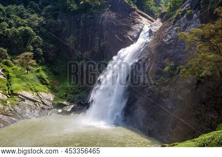 Dunhinda Waterfall In A Sunny Day In Sri Lanka