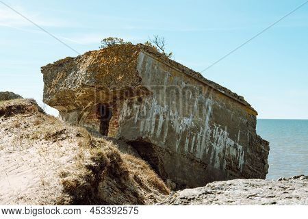 Ruins Of Bunkers On The Beach Of The Baltic Sea, Part Of An Old Fort In The Former Soviet Base Karos