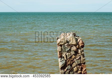 Ruins Of Bunkers On The Beach Of The Baltic Sea, Part Of An Old Fort In The Former Soviet Base Karos