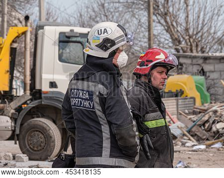 Borodyanka, Ukraine - April 2022: Search For People In The Rubble Of Houses. Bombed Houses Of Civili