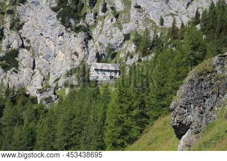 Italy, Ombretta Valley - August 27 2016: The View Of Onorio Falier Mountain Refuge, Italian Alps On 