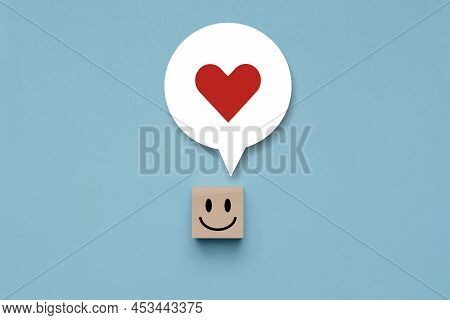 Wooden Cube With Happy Face With A Happy In Thought In Its Head, Wood Block With A Emotion Smile Fac