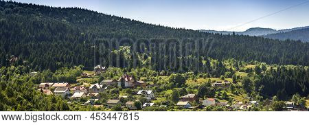Some Cottages And Unfinished Houses In The Valley Near The Spruse Forest In Carpathians, Lviv Region