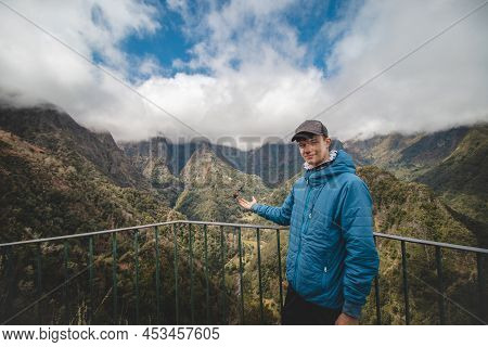 Rare Madeiran Chaffinch Flies Onto A Man´s Hand To Get Some Food Crumbs, The Man Enjoys This Once-in