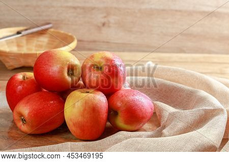 Closeup Group Of Fresh Jazz Apples On Wooden Board Background, Fruits Concept.