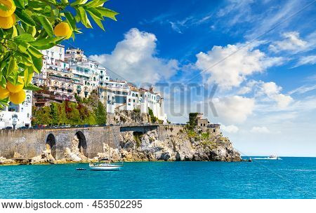 Beautiful View Of Amalfi On The Mediterranean Coast With Lemons In The Foreground, Italy