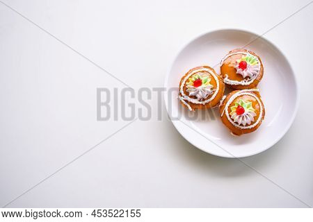 Thai Cake Traditional On Plate.kanom Kai. Dessert Snack Original Style Thai. Cake Jam Orange And Cre