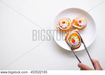 Thai Cake Traditional On Plate.kanom Kai. Dessert Snack Original Style Thai. Cake Jam Orange And Cre