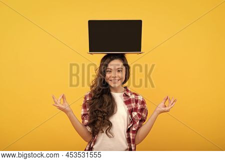 Happy Smart Teen Girl Meditating With Laptop On Head Presenting School Online Lesson, Estudy