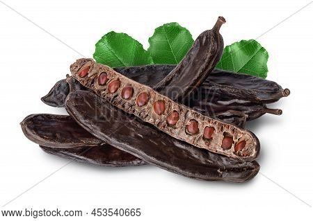 Ripe Carob Pods And Bean Isolated On White Background With Clipping Path And Full Depth Of Field