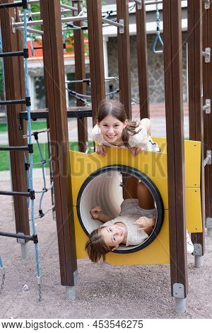 Sisterhood, Friendship. Two Charming Teen Girls Having Fun On A Modern Playground. Sister, Bffs Comm