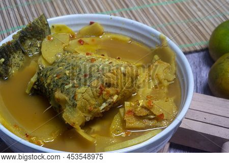 Southern Thai Gaeng Som - Sour White Snapper Fish Soup With Bamboo Shoots, Spicy Flavor.