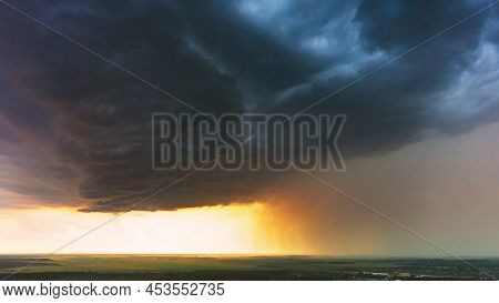 Aerial View Storm Cloudy Rainy Sky. Dramatic Sky With Dark Clouds In Rainy Day. Storm And Rain Above