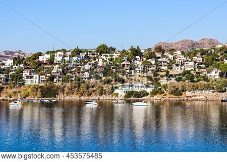 Blue Sea, Islands And Boats On The Aegean Coast. Summer Vacation And Coastal Nature Concept